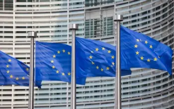 A row of EU flags blowing in the wind.